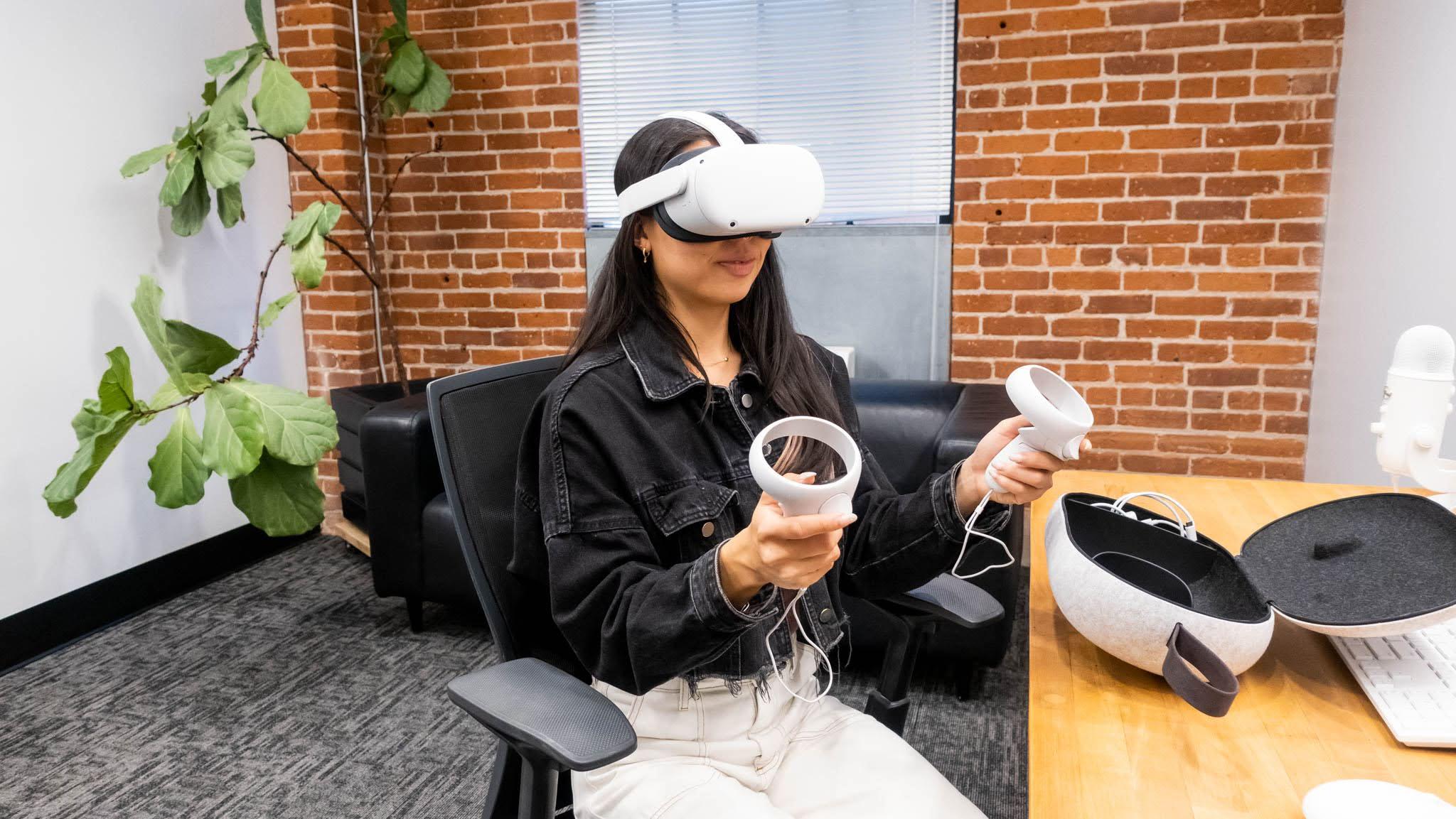 Blink Researcher wearing AR goggles demonstrating a mock hardware research session.