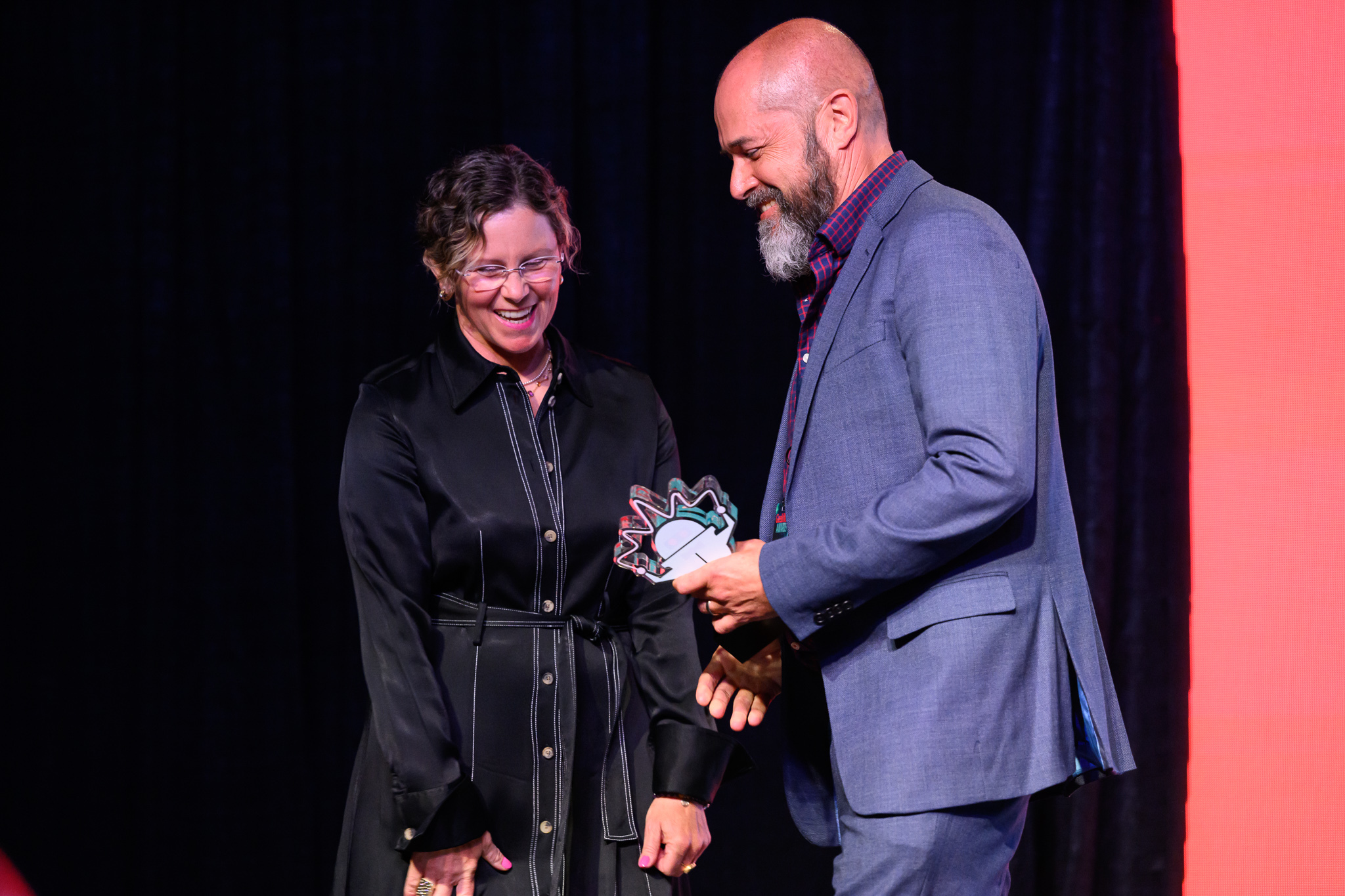 Blink CEO Karen Clark Cole presenting the award to