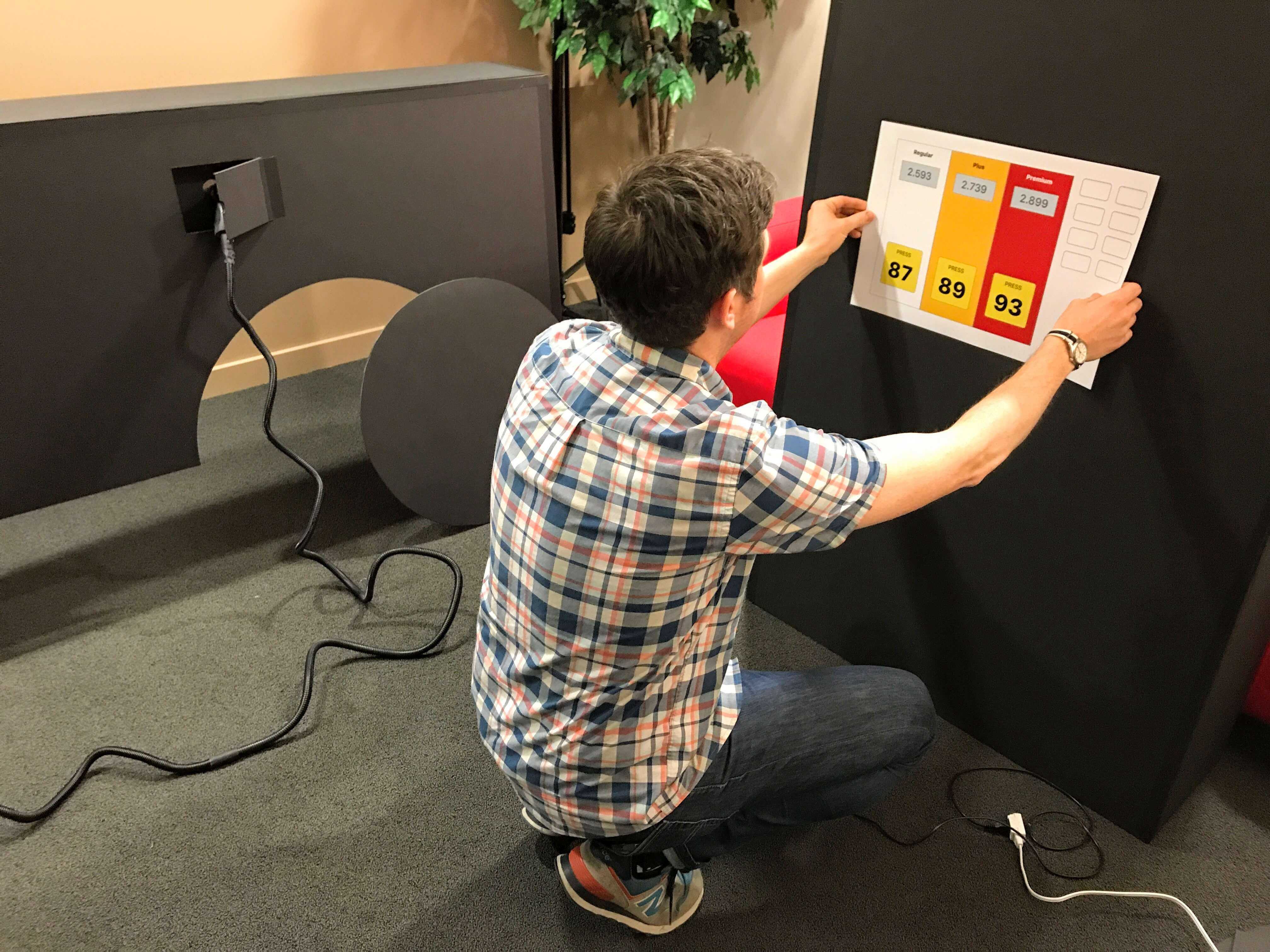 A Blink staff member customizing a lab with real-world props
