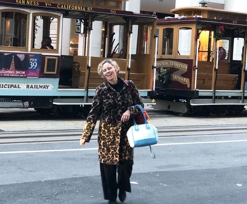 Karen Clark Cole in front of a San Francisco trolley.
