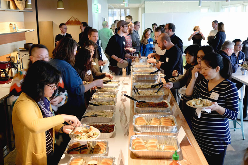 Blink and Redshift Digital team members sharing a meal together.