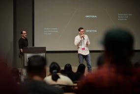 Geoff and Bill on stage speaking at ConveyUX conference