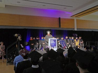 Kelly Franznick Addresses The Graduates At The Uw Hcde Graduation
