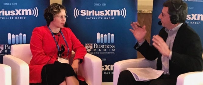 Photo of Karen Clark Cole interviewed by Forbes senior editor of entrepreneurship, Loren Feldman