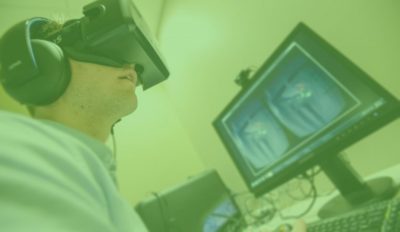 A photo of a person wearing virtual reality glasses