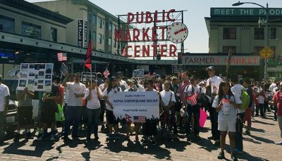 A crowd in front of Pike Place Public Market