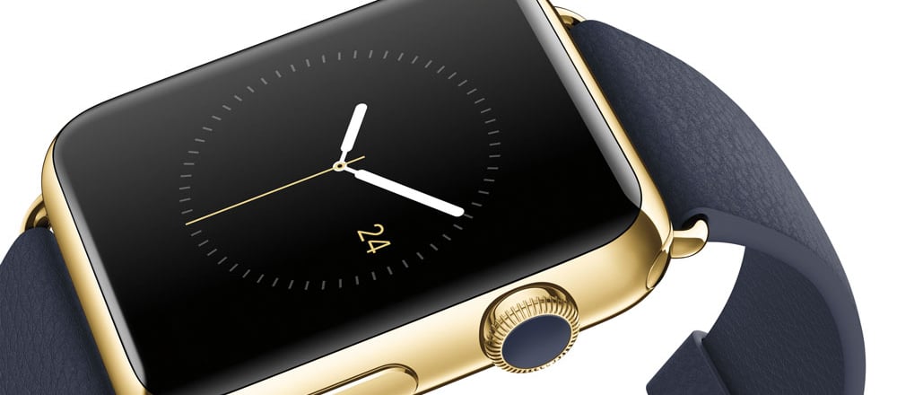 Clock hands on gold Apple Watch with a black strap.