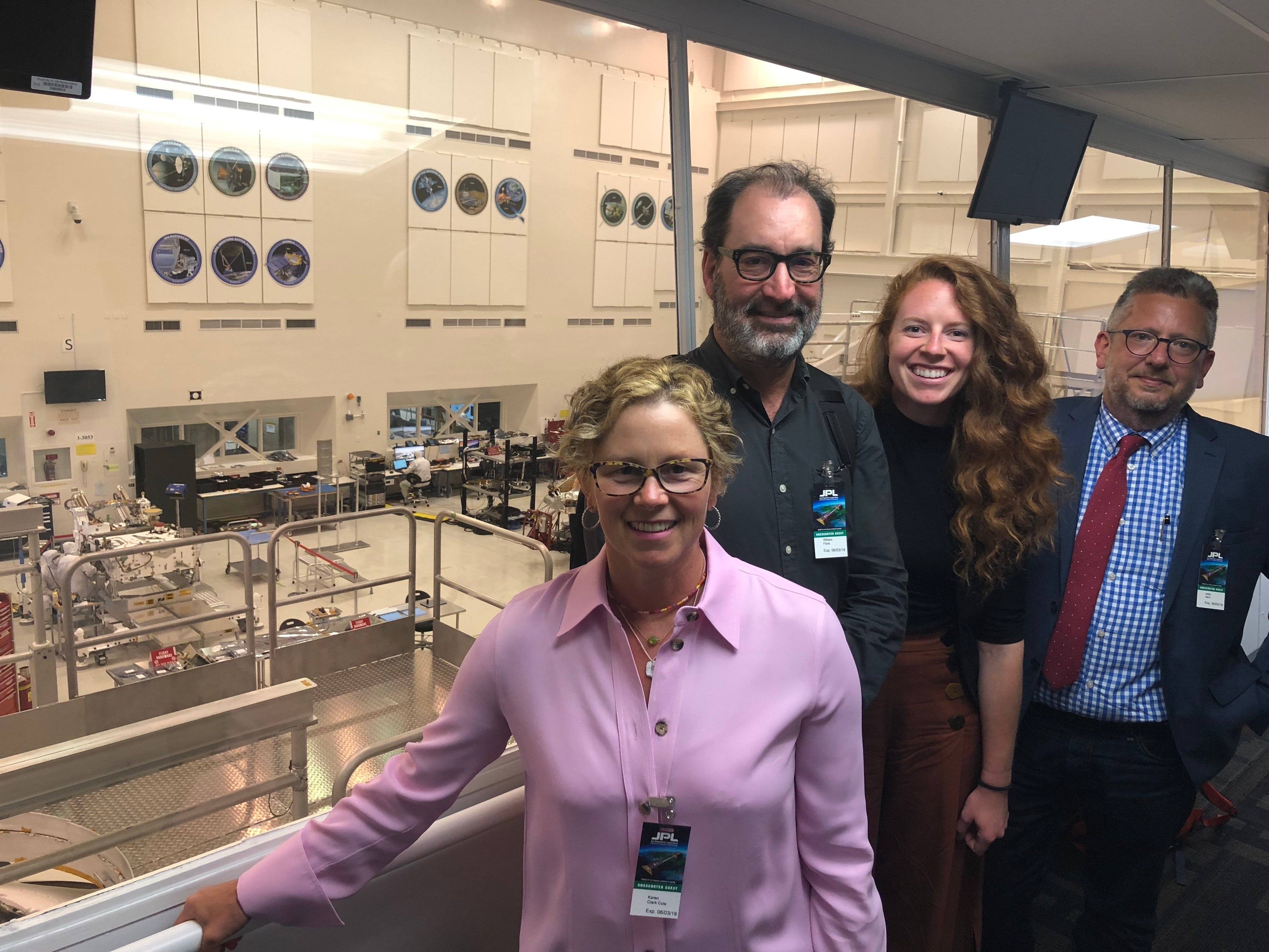 Blink team members at NASA's Jet Propulsion Lab (JPL) clean room observation deck.