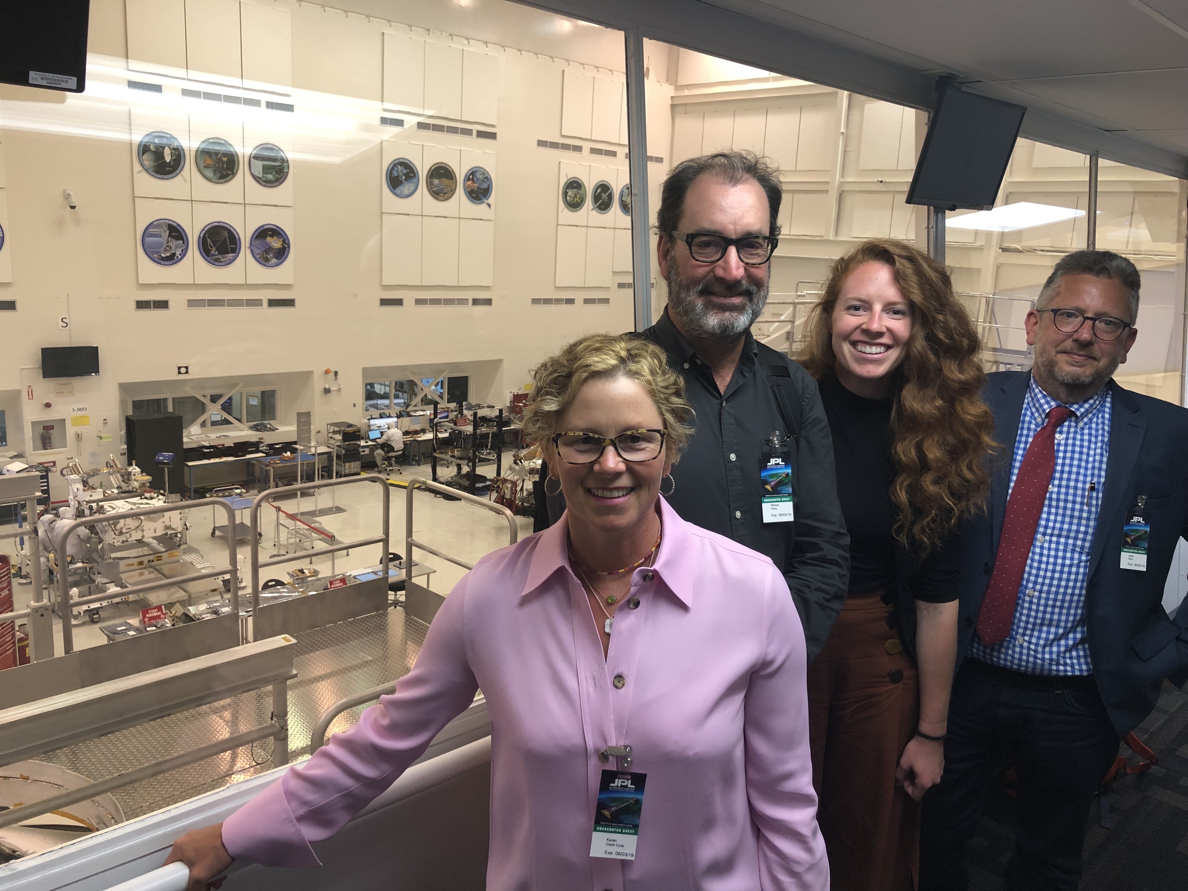 Blink team members at NASA's Jet Propulsion Lab (JPL) clean room observation deck.