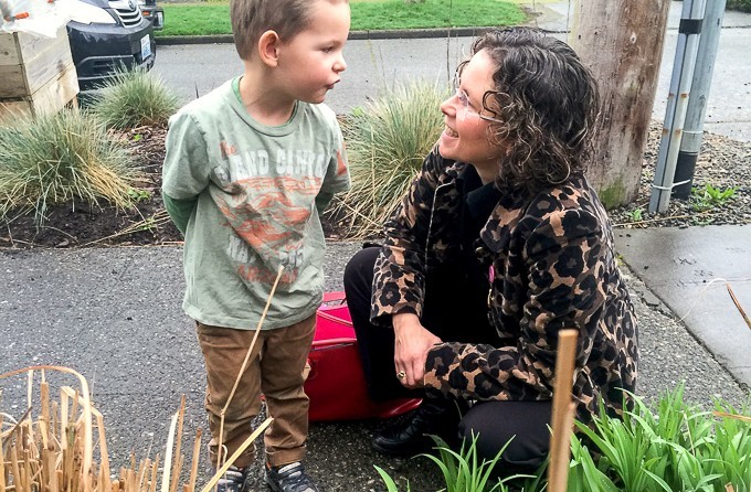Karen Clark Cole talking with a young child.