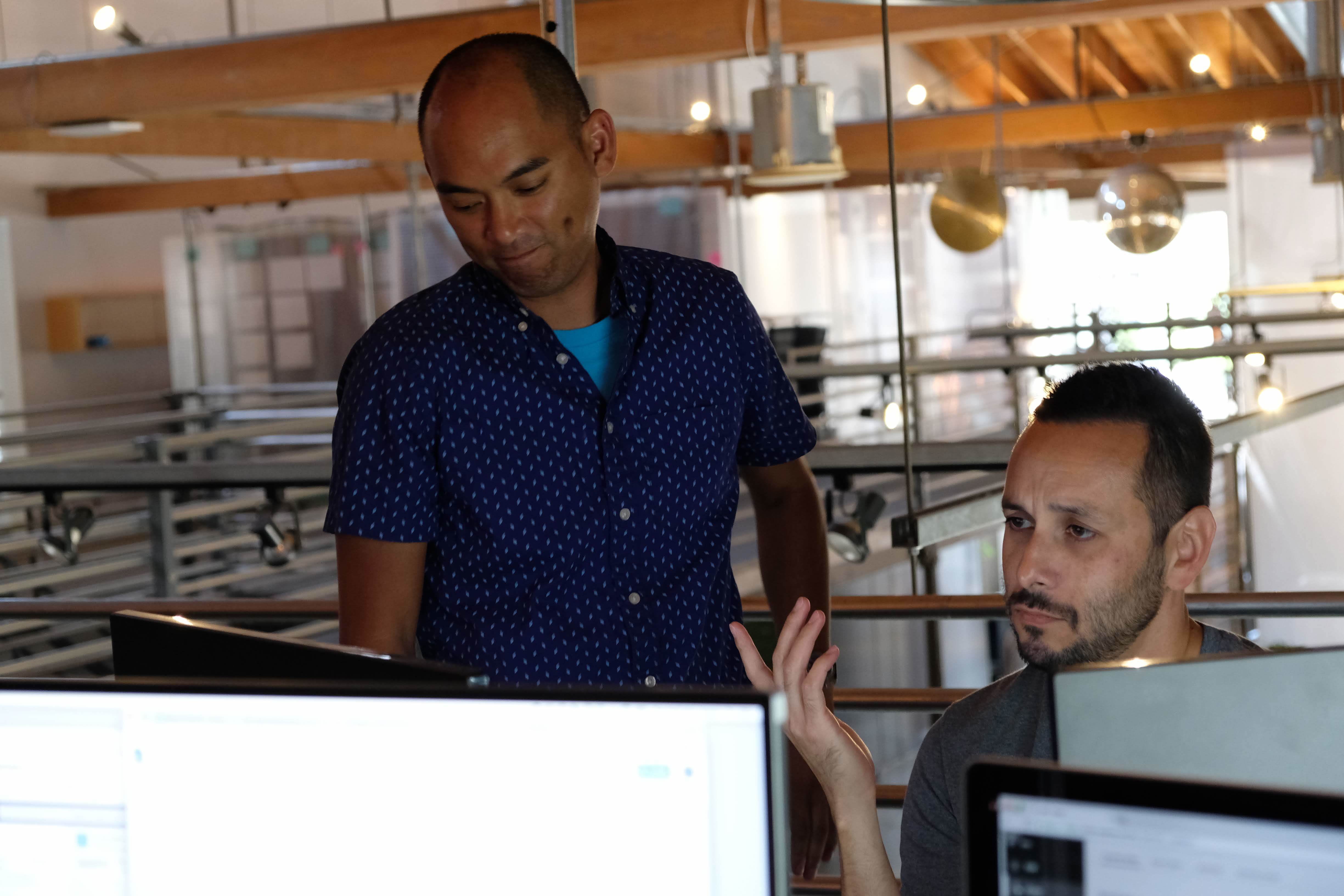 Blink's Principle Design Technologist, Eric Gomez, and visual designer, Orville Esoy, collaborating on a project in our San Diego studio.